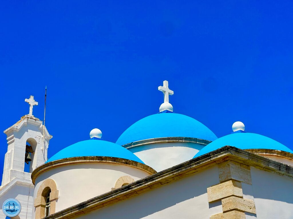 At the village Kounavi there is a three aisled Byzantine church dedicated to the Transfiguration of Christ, Saint Nicholas and Saint Demetrius, which is the central church of the village, but not the patron saint. This temple is unique as it has five domes, one large in the center and four smaller around it. According to tradition it was built by five unmarried sisters.